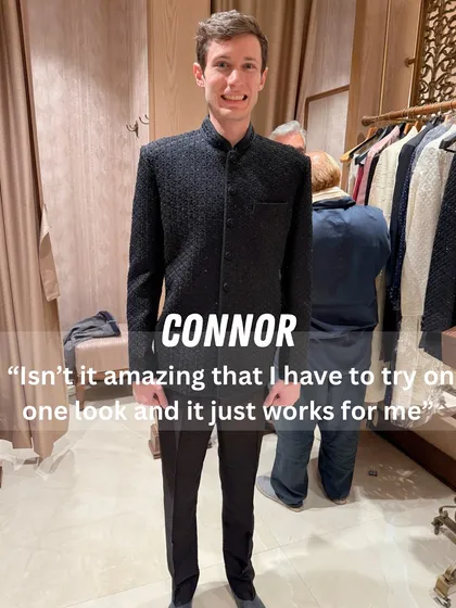 Sometimes, the first look is the one. This groom looks sharp and sophisticated in a classic black bandhgala, proving that simple and well-fitted is always a winning combination.