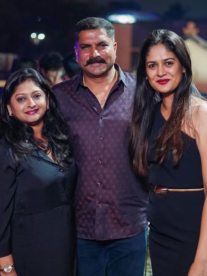 A group of guests posing for a photo.