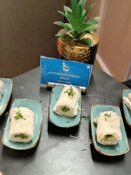 Our delicate Asparagus Cheese Rolls, individually plated for an elegant and easy-to-eat appetizer experience.