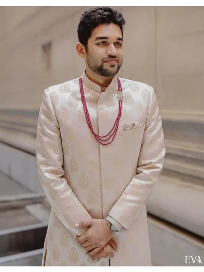 A handsome portrait of the groom-to-be, Madhusudhan, looking sharp in his traditional engagement attire.