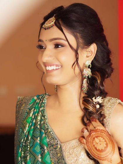 Nony's radiant smile during her Mehendi ceremony. The natural, earthy makeup look I created for her was designed to feel lightweight and comfortable while looking beautiful in photos.