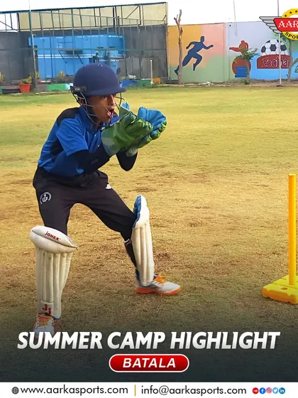 A young wicketkeeper in action during our summer camp. We teach them to stay low and be ready for anything behind the stumps.