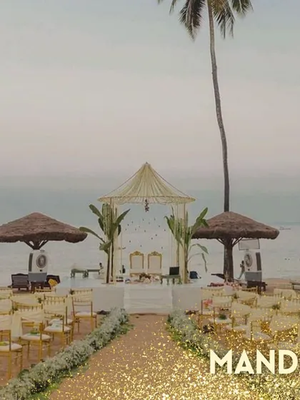 An image from a blog post showing a beautiful beachside mandap, used to spark ideas for a client's dream wedding.