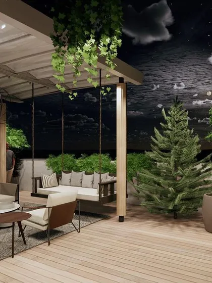 This nighttime render of the terrace shows how lighting design can create a magical ambiance. The combination of overhead lights, hanging vines, and soft landscape lighting makes the space feel cozy and enchanting.