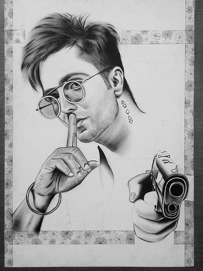 The 90-hour process behind my photorealistic pencil drawing of Harrdy Sandhu. Notice the detail in the sunglasses reflection and the texture of the shirt.