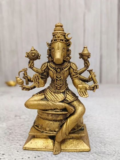 A brass idol of Lord Varaha, the boar avatar of Lord Vishnu. This is a unique and powerful idol for your collection.