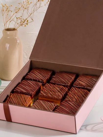 My Millionaire Shortbread gift box is a true indulgence, filled with bars of crunchy shortbread, gooey caramel, and rich chocolate.
