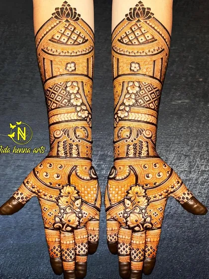 A beautiful Indian bridal design with architectural elements. The domes and patterns give it a royal feel, perfect for a bride on her special day.