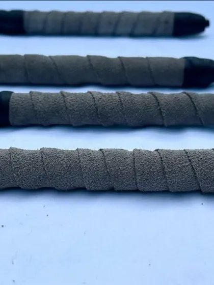 A close-up of the handcrafted leather grip handle on my Heeling Stick. Quality equipment makes for a better training experience for both you and your dog.