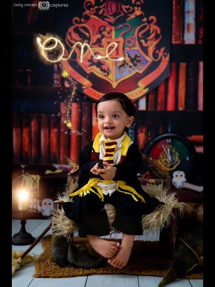 Celebrating a magical first birthday. I can even add special effects, like this glowing "one" created by a wand, to make your Harry Potter themed photos even more special.
