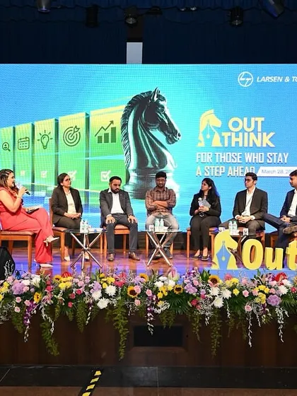 Moderating a panel is about more than asking questions; it's about steering a dynamic conversation. Here, I'm guiding a discussion on career growth with the leadership team at Larsen & Toubro's 'OutThink 2025' event.