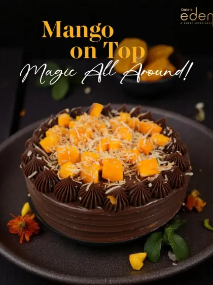 Mango on top, magic all around. This chocolate cake is generously topped with fresh mango and grated white chocolate, creating a magical flavor combination.