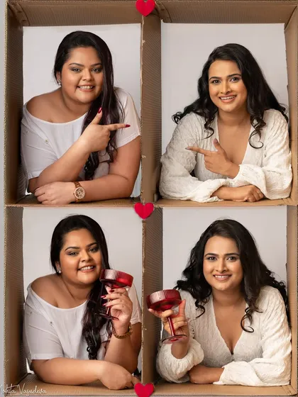 A fun and creative "in the box" photoshoot to celebrate friendship. These two besties had a blast pointing at each other and raising a glass, capturing the playful spirit of their bond.