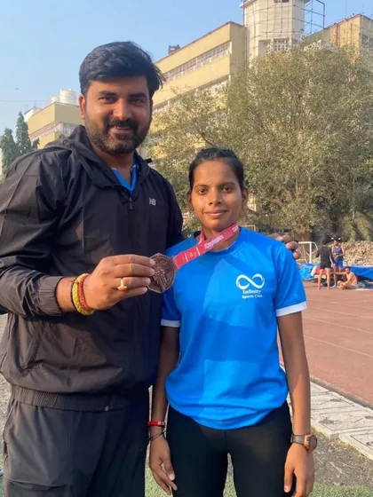 Another shot with Soni and her back to back medal. Consistency is the key to long term success in running.