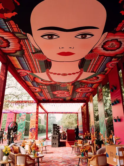 Art is at the heart of my designs. For a vibrant Mexican-themed event, I created a stunning ceiling installation featuring the iconic face of Frida Kahlo, transforming the space into a living canvas of color, passion, and creativity.