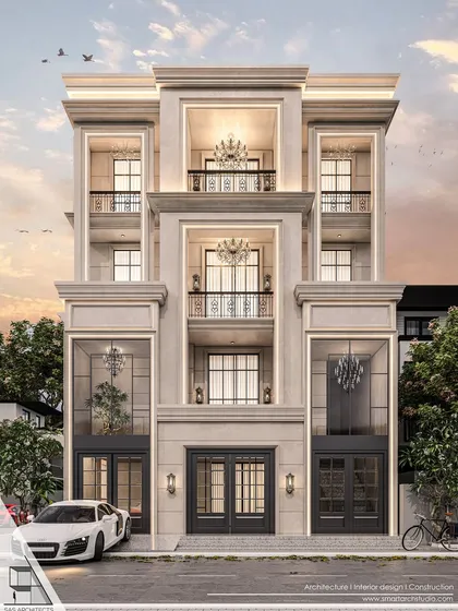 A design proposal for a residence in Vikaspuri. This symmetrical façade features grand chandeliers visible through large windows, ornate balcony railings, and classical moldings, all hallmarks of a luxurious neoclassical style.