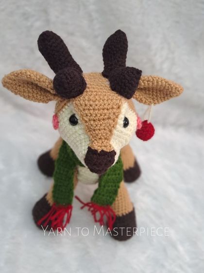 A front view of the adorable reindeer toy.