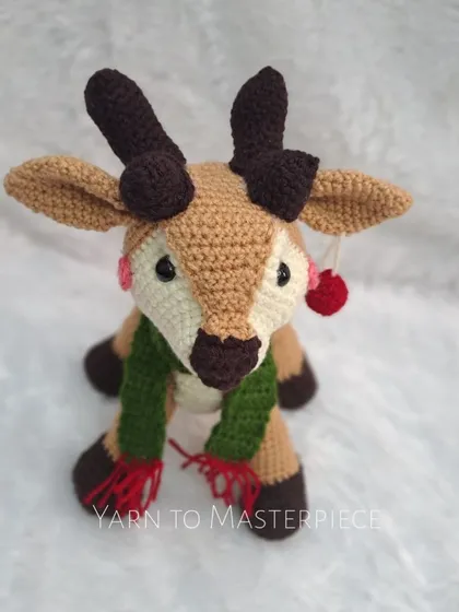 This version of the reindeer has a little red pom-pom earring for an extra touch of holiday cheer.