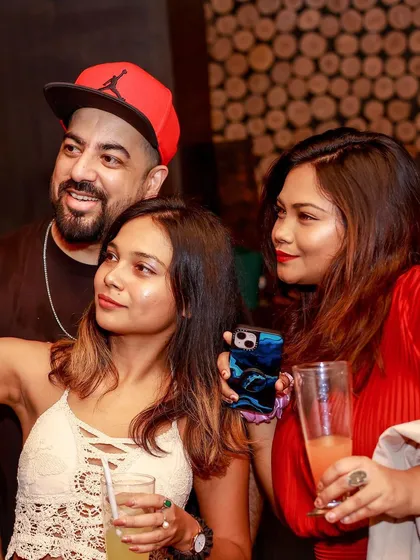 Posing with guests at Loft38. It's always a party with friends.