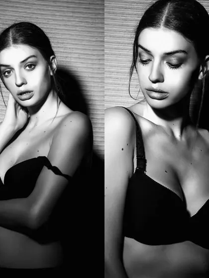 A black and white artistic shot for a lingerie or boudoir session. This style is effective for showcasing a model's range or for brands with a more intimate aesthetic.