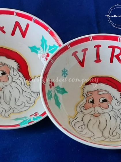 A closer look at our personalized Christmas-themed bowls. Each bowl is customized with a name, making holiday meals extra special for the little ones in the family.