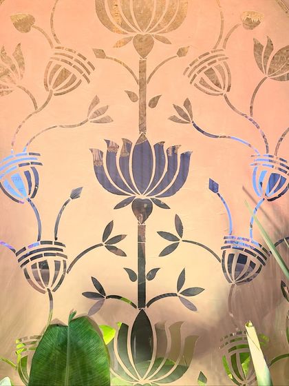 An intimate look at the lotus motif, revealing the subtle texture and shimmer of the materials used.