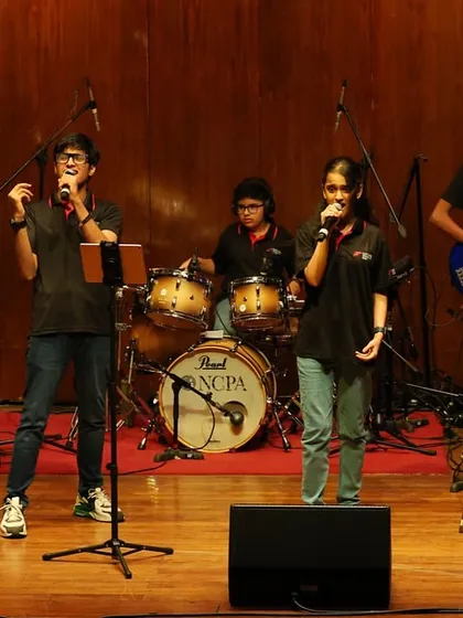 This is what it's all about: our students, formed into a band through our Artist Club, owning the stage at the prestigious NCPA. From learning their instruments in our classrooms to performing with professional sound and lighting, we guide them every step of the way, building their confidence and teamwork skills for live band performances.