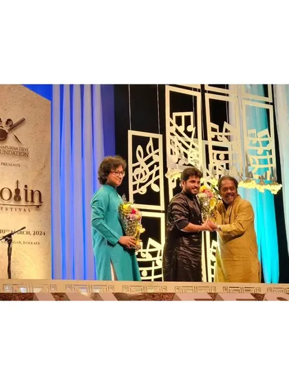 Being felicitated on stage after a concert with the amazing violinist Manas Kumar bhai. Collaborating with artists from different instrumental traditions is always a wonderful learning experience.
