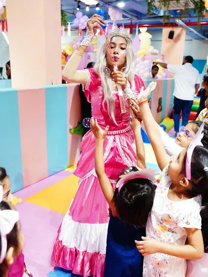 Our princess performer engages the children with a fun bubble-blowing activity. Interactive play is a key part of the entertainment we provide.
