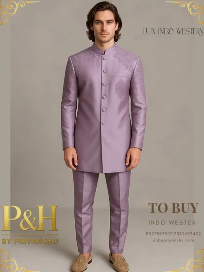 A unique creation in a soft lilac hue, this Indo-Western suit is crafted from self-embroidered handloom silk. The subtle texture of the fabric itself provides a quiet yet profound sense of luxury.