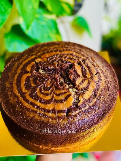 A close-up of another whole wheat marble cake, showing the beautiful pattern created by the vanilla and chocolate batters.