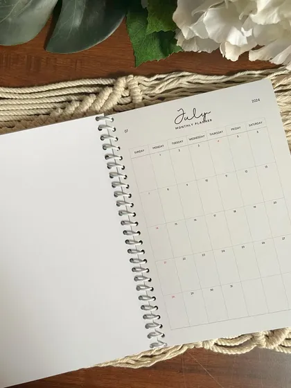 The July monthly planner page, with a clean grid layout for all your important dates and appointments.