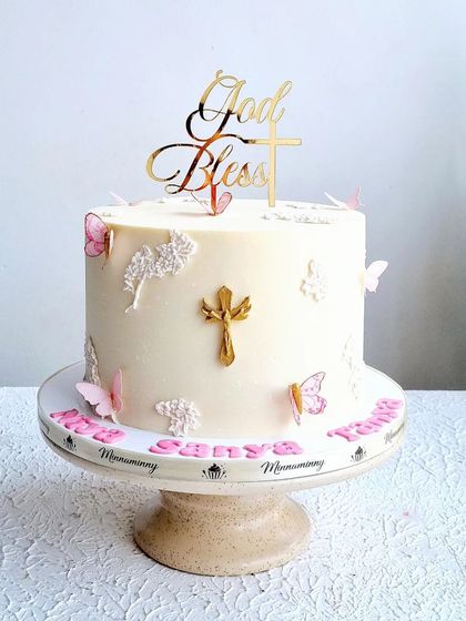 A full view of the Holy Communion cake, showing its simple and elegant design.