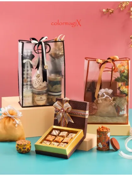 Another variation of our transparent hamper bags, this time with black and rose gold accents. They are perfect for creating a sleek and luxurious gift presentation.