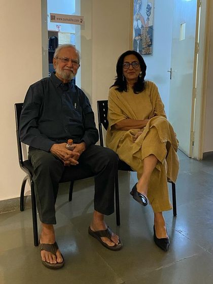 The curator, Pushpamala N., and the artist, Gulammohammed Sheikh, seated in the gallery. A beautiful moment between a student and her teacher.
