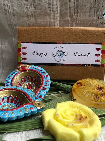 My "Happy Diwali" gift set, featuring two handmade soaps and two beautiful, hand-painted diyas. A perfect, eco-friendly gift for the festival of lights.