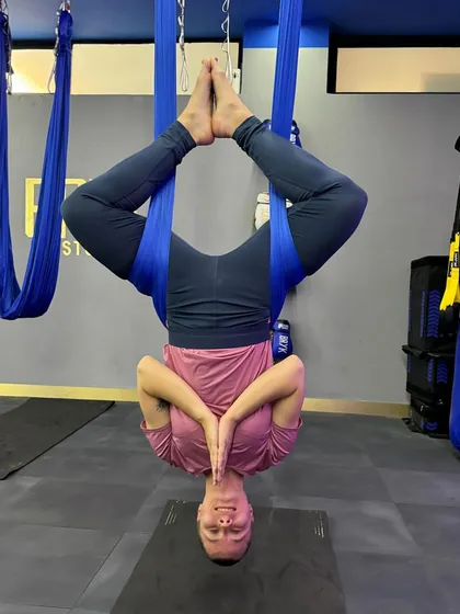 Finding zen and a smile while inverted. This is what we call a mood booster.