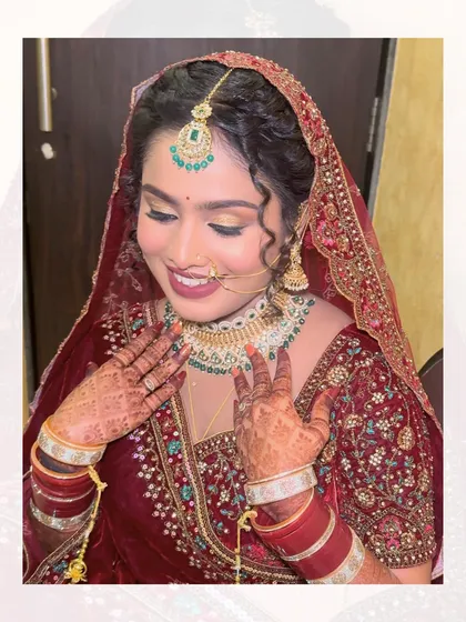 The happy, glowing bride. Her makeup is a perfect balance of shimmer and matte, creating a multi-dimensional look that is stunning in person and on camera.