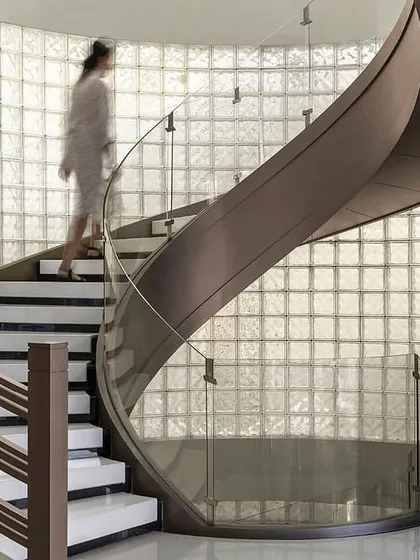This sculptural spiral staircase at The Layered Office in New Delhi is a centerpiece of the renovation, demonstrating our focus on creating elegant architectural details that enhance the user's experience of a space.