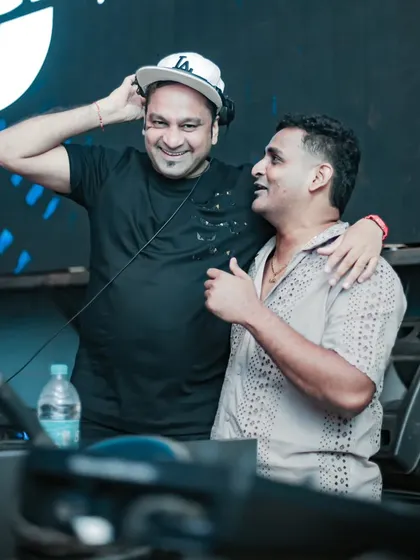 It's all about having fun and sharing that energy with the crowd. A moment of connection with my Tribal Brother during a packed set, making sure the vibe stays high all night.