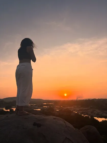 Standing before the sunrise, a symbol of new beginnings and endless possibility. My journey is about embracing the light and sharing it forward, and I am grateful for every step of the way.