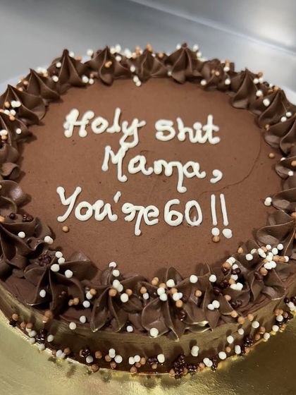 "Holy shit Mama, You're 60!!". This is how you celebrate a milestone birthday with love and a whole lot of humor. This is my ultimate chocolate cake, perfect for an amazing mom.