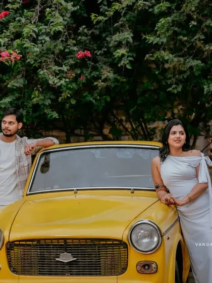 Fun and quirky moments with a vintage yellow car. This shoot shows how props can bring out a couple's playful side, making for unique and charming photos.