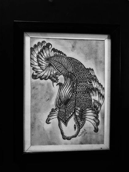 A beautiful betta fish drawn in black and white, with its flowing fins decorated in zentangle style.