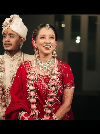 A beautiful, classic portrait of the bride and groom, capturing their happy and radiant smiles.