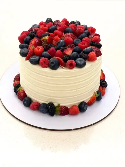 Berries, and more berries! I love it when clients give me a free hand to create something beautiful, like this vanilla cake loaded with fresh mixed berries.