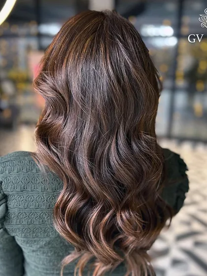 When your hair shines brighter than your future plans. A beautiful, rich brown with soft, flowing waves.