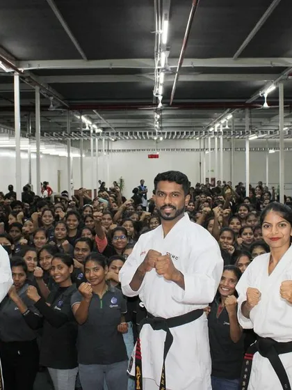 We were honored to conduct a self-defense awareness program for nearly 300 women at Ather. This image captures the energy and scale of our corporate workshops, where we empower teams with essential safety skills in a large group setting.