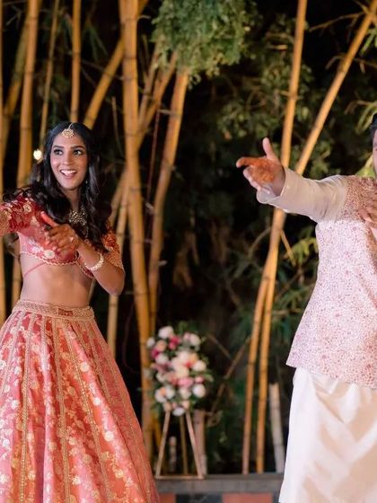 This couple wanted a peppy and fun Bollywood number. You can see the joy on their faces as they perform the easy-to-learn steps we practiced.