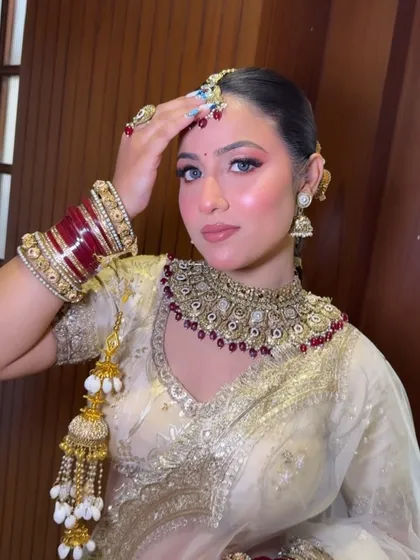 A final shot from the Amritsar Masterclass, highlighting the maang tikka, the glowing highlighter, and the overall bridal radiance.